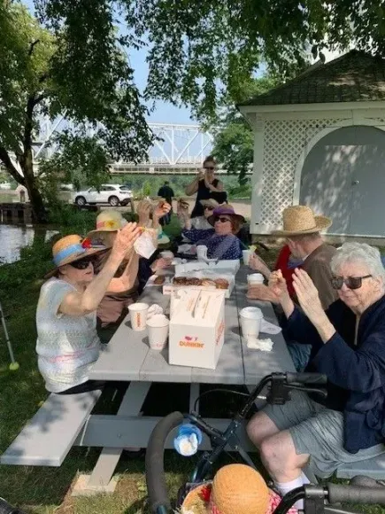Residents enjoying an outdoor gathering at Chestelm